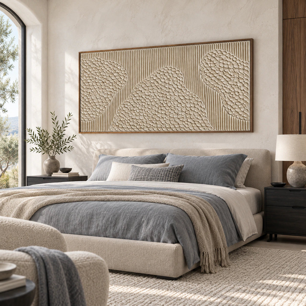 Wide off-white textured painting above a low upholstered bed in a quiet bedroom.