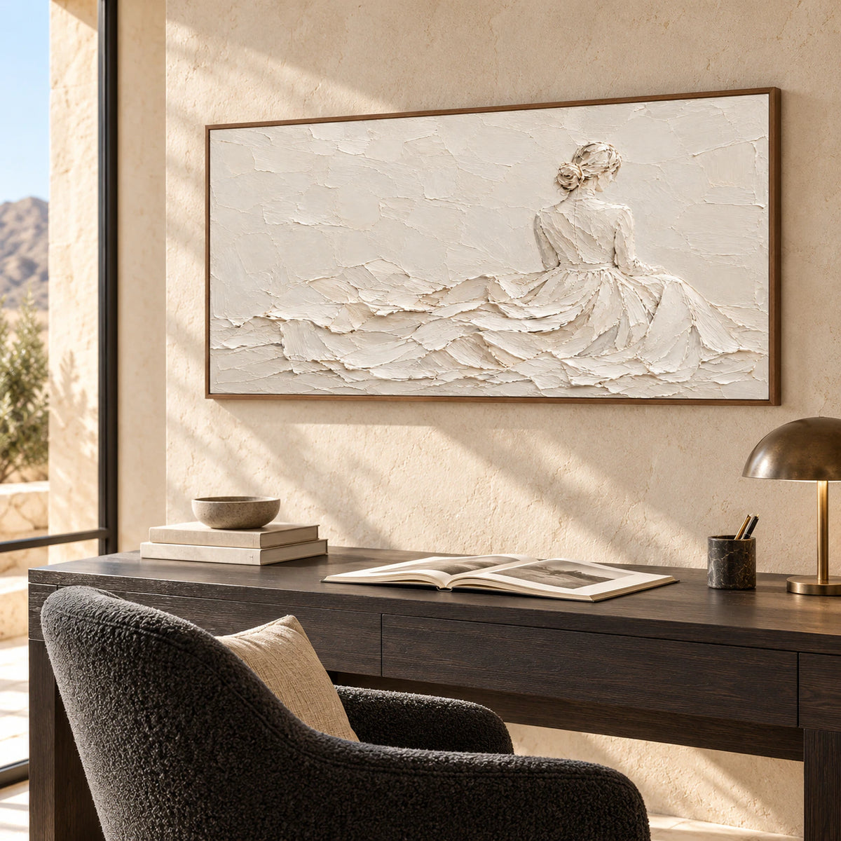 Ivory-Reverie above a dark desk beside a reading chair in an airy, bright home office, viewed from the right at seated height.