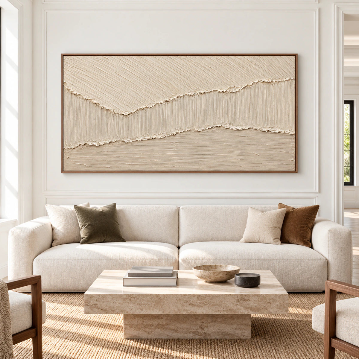 Large ivory and beige textured abstract painting displayed prominently on the long wall of a bright, spacious modern living room.