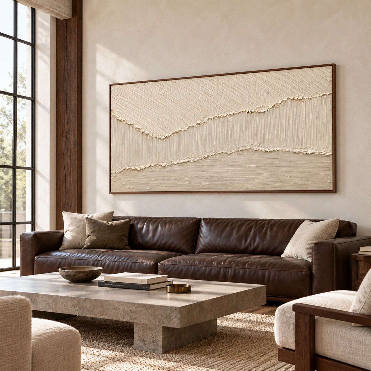 Large ivory ridged artwork as the focal point of an expansive loft interior with tall windows, concrete details, and restrained furnishings.