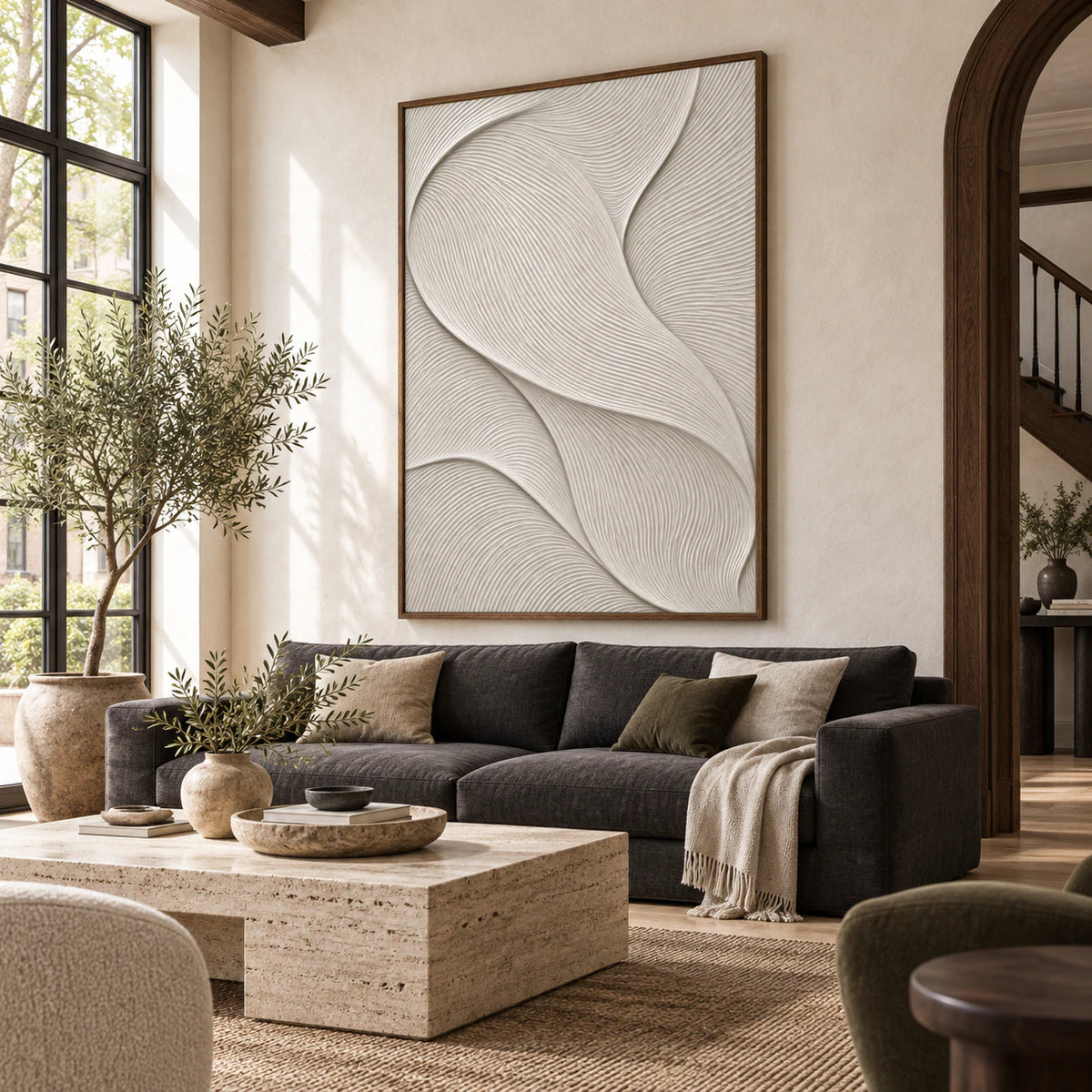 Ivory flowing-ridge abstract artwork above a bright contemporary living room sofa.