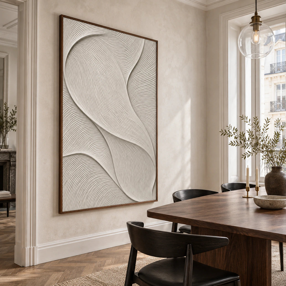 Vertical ivory textured abstract artwork in a refined daylight-filled dining room.