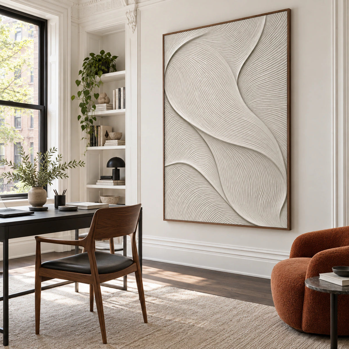 Textured ivory abstract artwork in an airy home office reading space with natural daylight.