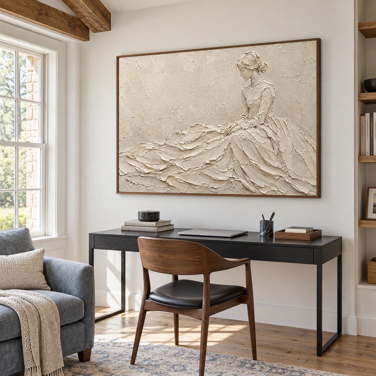 Large textured ivory painting in an airy home office with a simple writing desk.