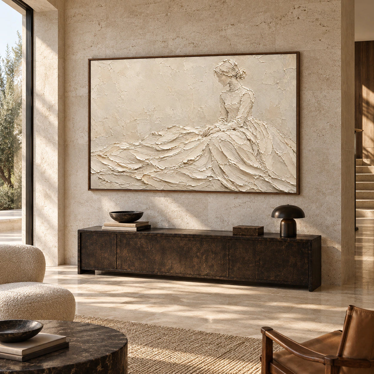 Ivory figure artwork displayed at gallery scale in a bright, open foyer.