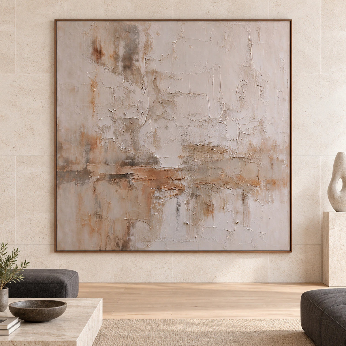 Large square ivory and sand textured abstract painting shown straight-on in a spacious daylight interior.