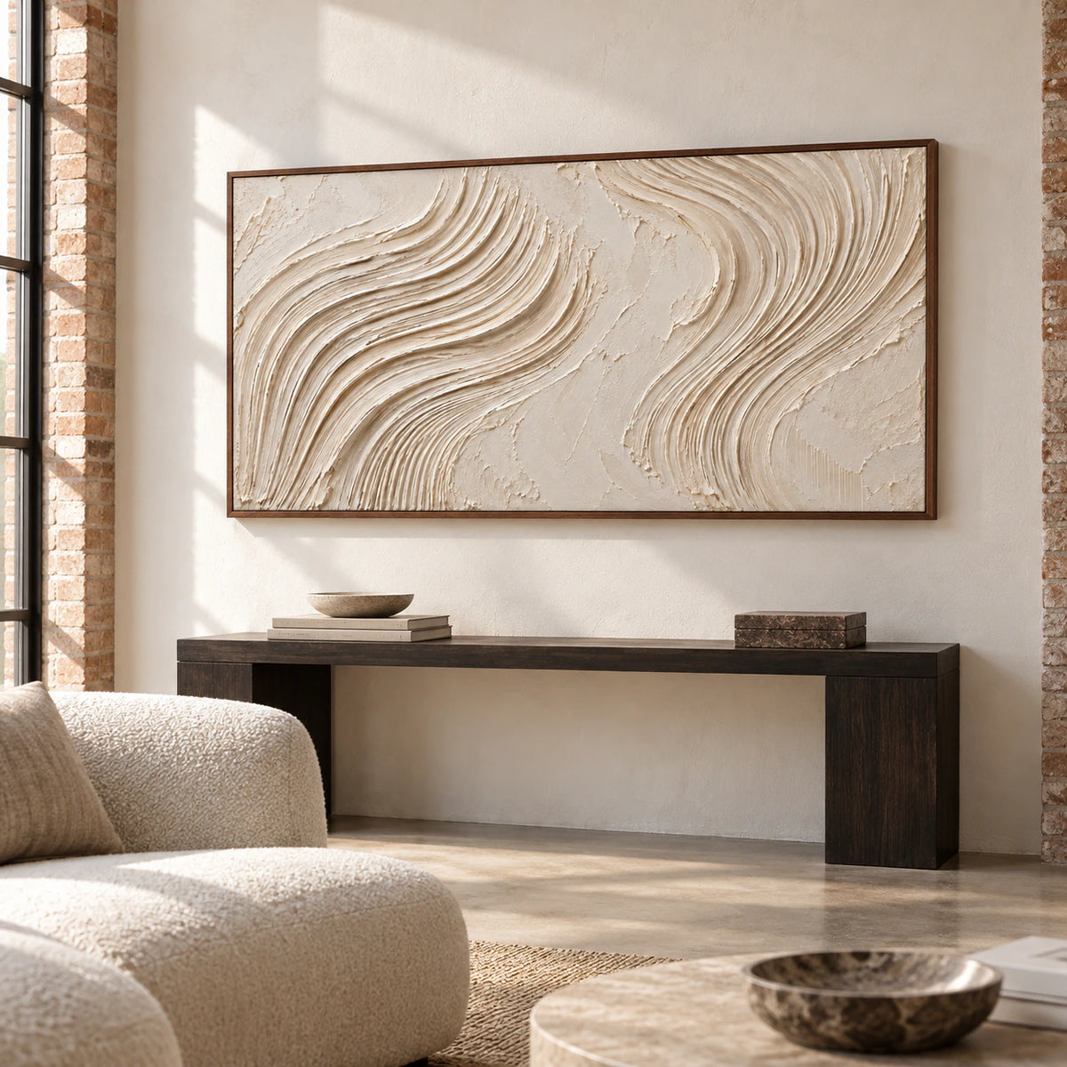 Oversized ivory ridged artwork displayed prominently in a bright gallery-scale foyer with stone flooring.