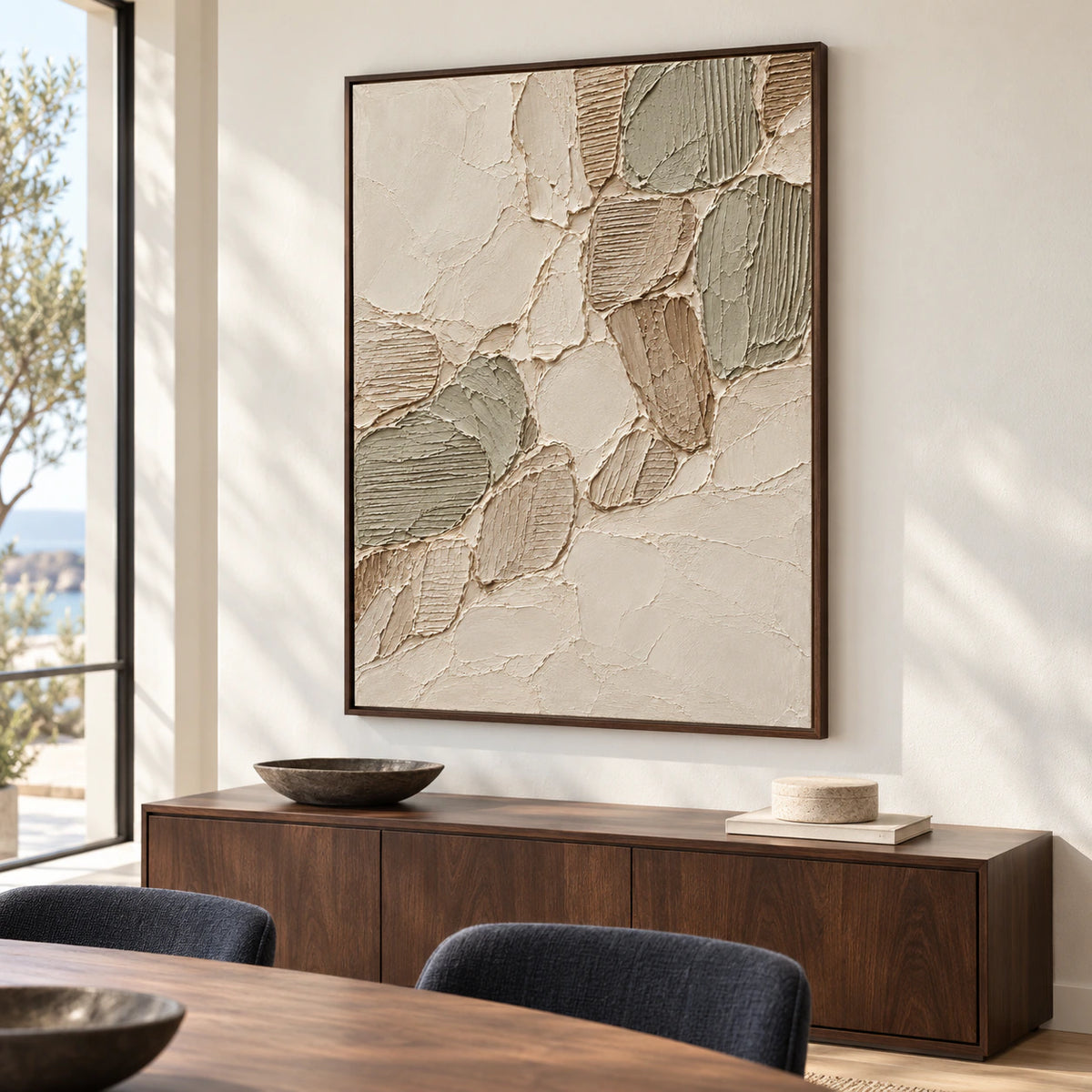 Vertical Linen-Tesserae artwork above a dark walnut sideboard on a soft white dining room wall, viewed from the right at standing height in daylight.