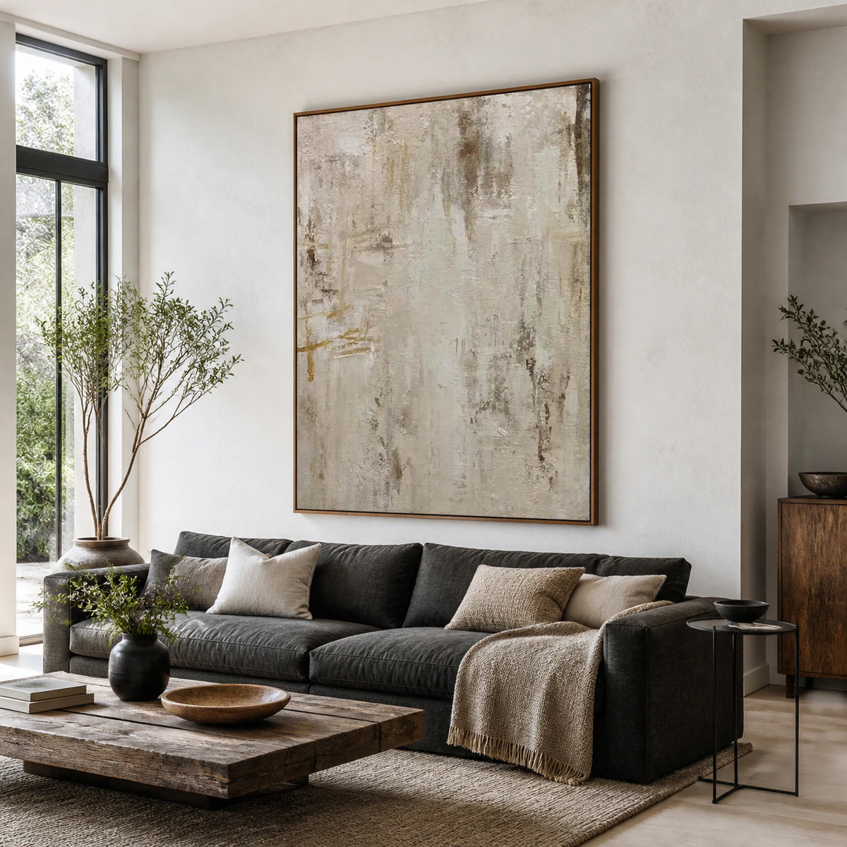 Linen-Trace painting above a pale sofa in a bright contemporary living room.