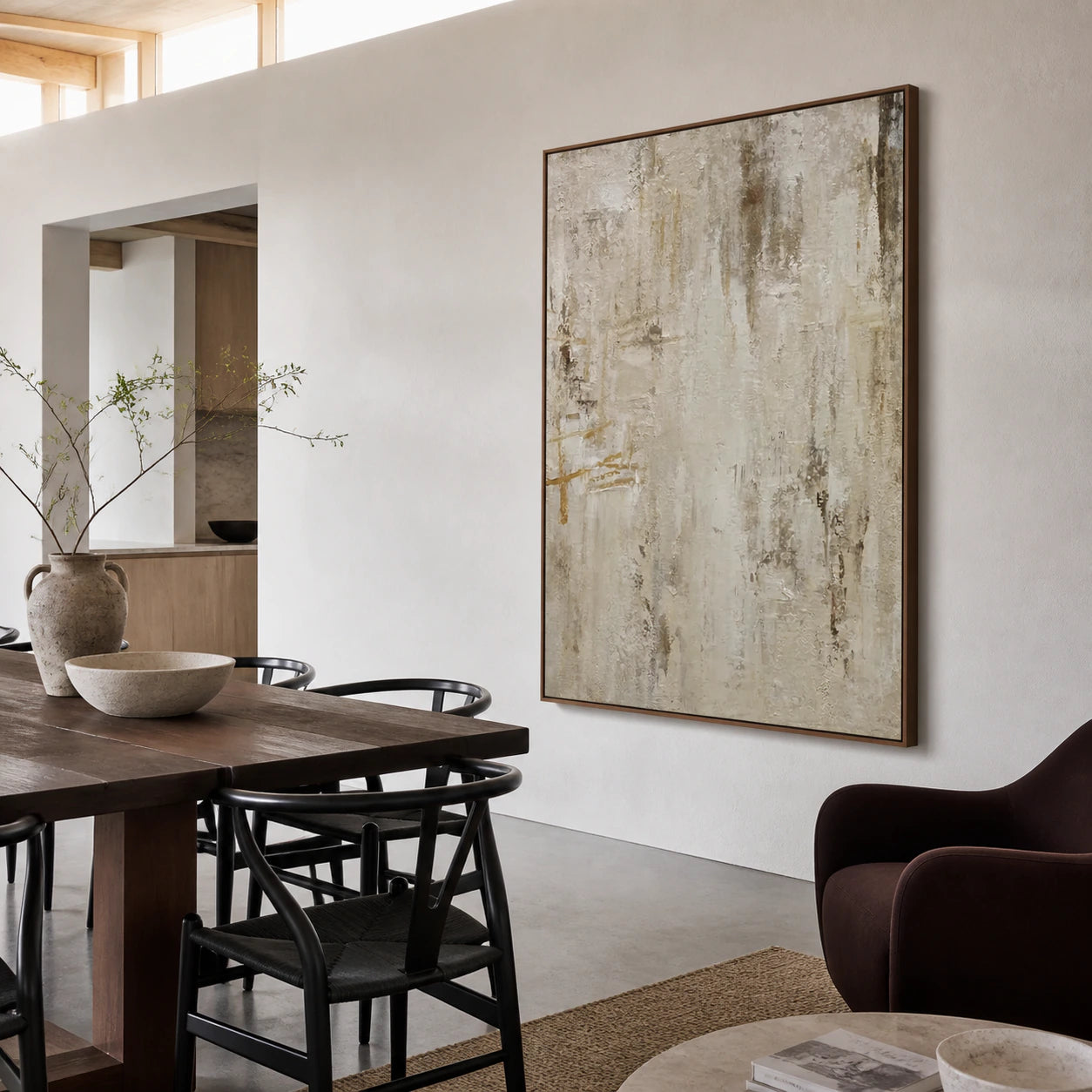 Linen-Trace painting in a refined daylight dining room with sculptural furnishings.