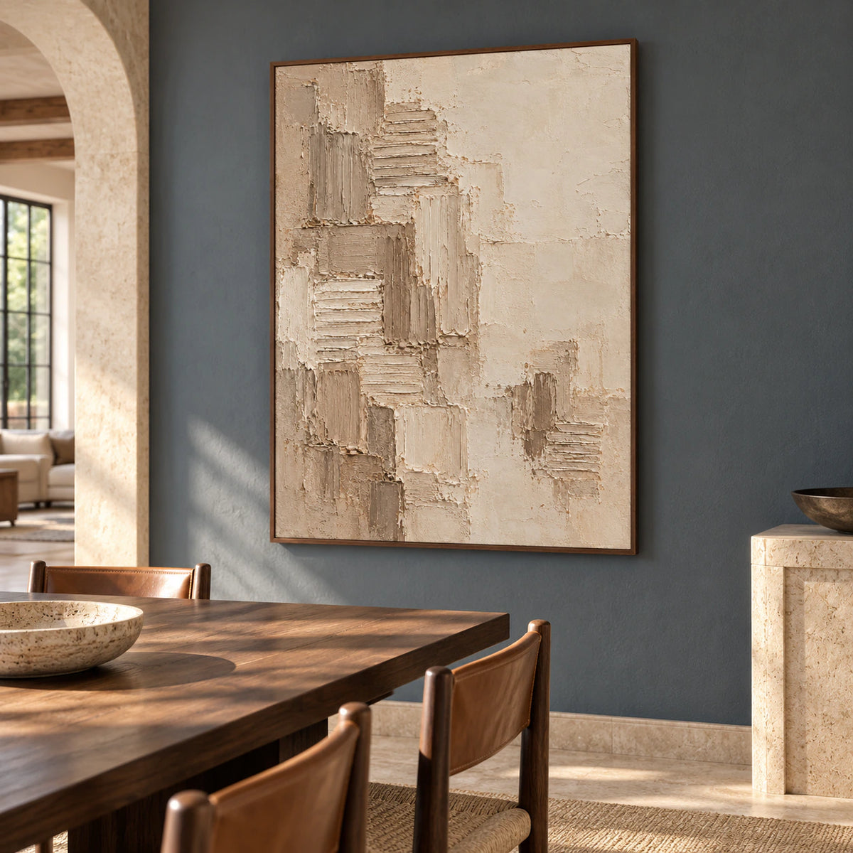 Vertical textured painting as the focal point of a refined dining room with a dark wood table.