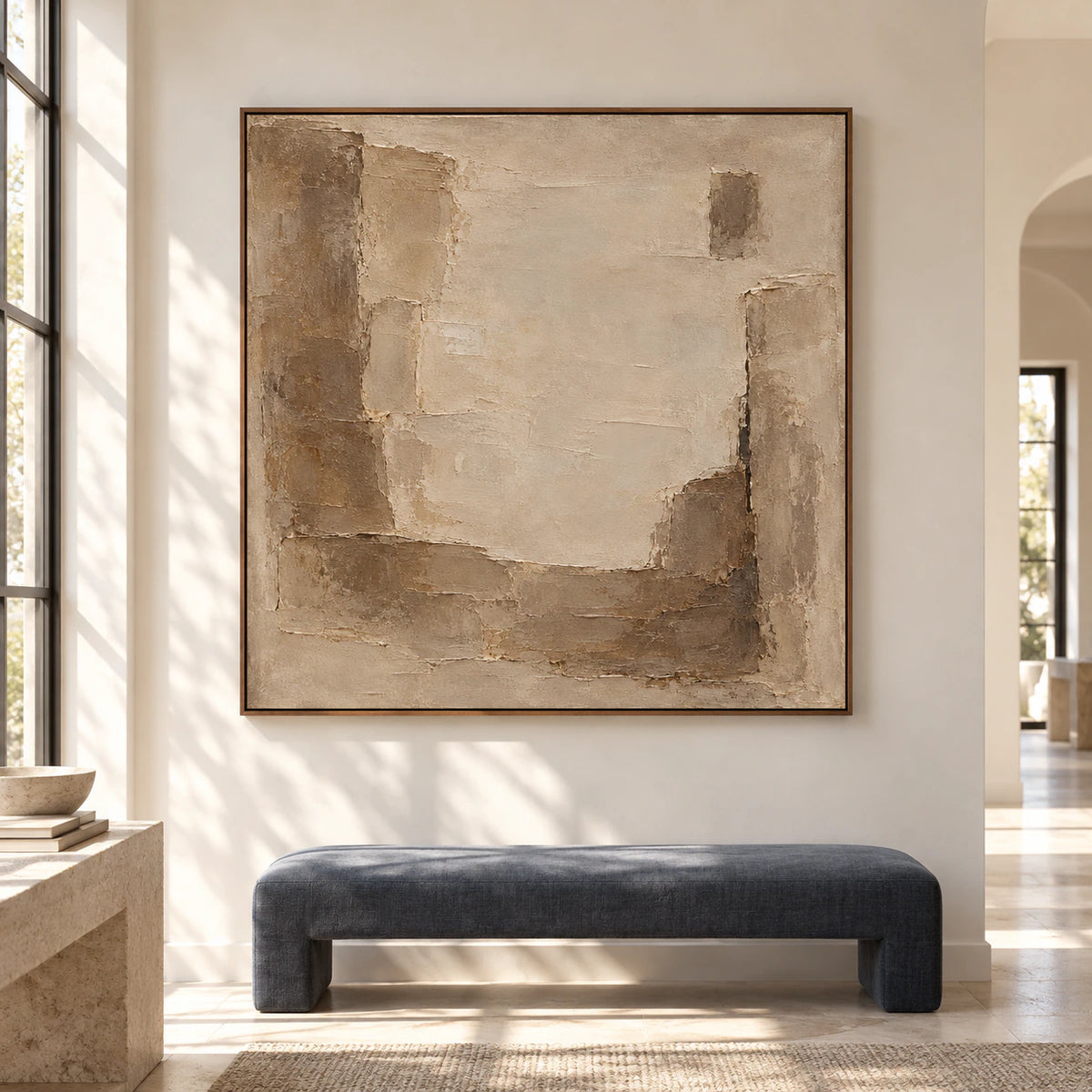 Large square Marl-Bastion abstract painting with pale marl and umber blocks in a bright, spacious interior.