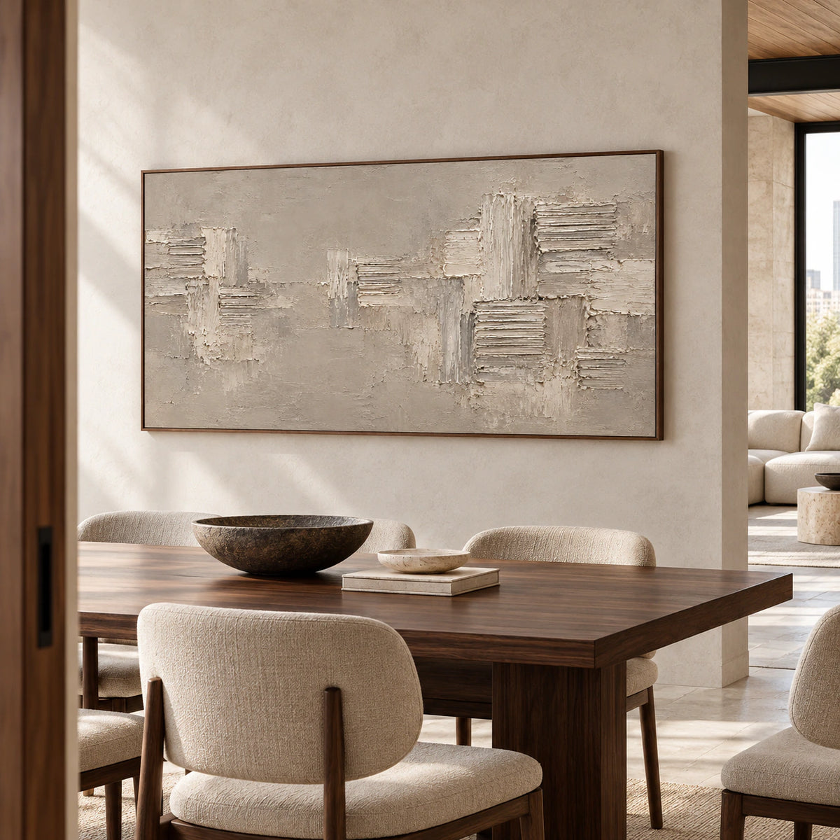 Wide textured taupe and ivory abstract painting anchoring a refined dining room.