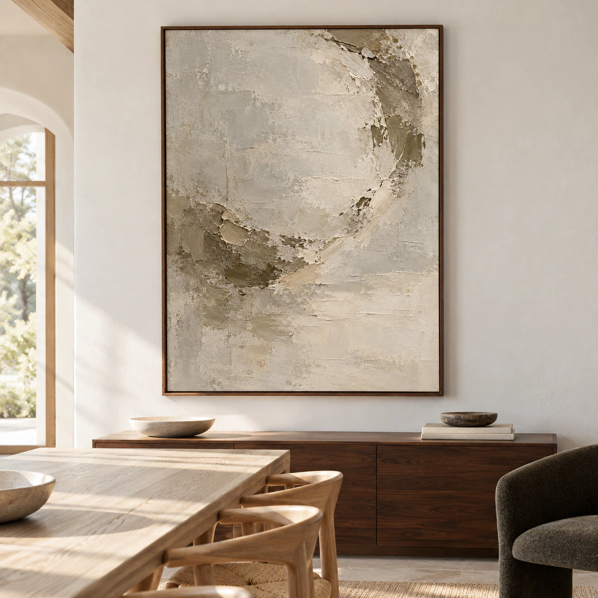 Marl Halo displayed in a refined dining room above a dark wood sideboard, seen from a slight left angle.