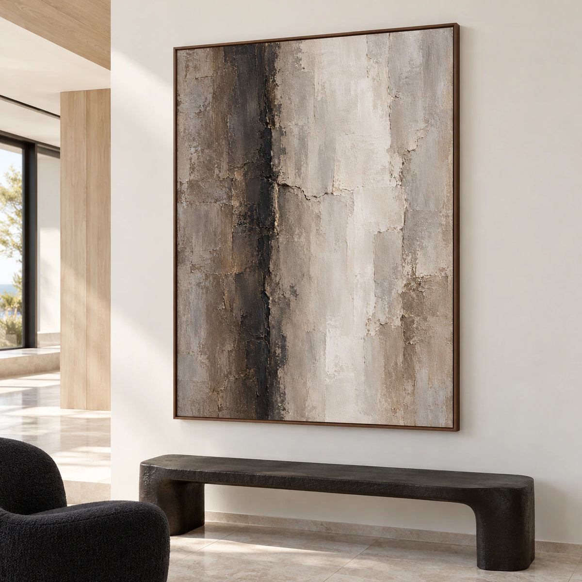 Large vertical abstract artwork commanding a spacious foyer with a stone floor and generous daylight.