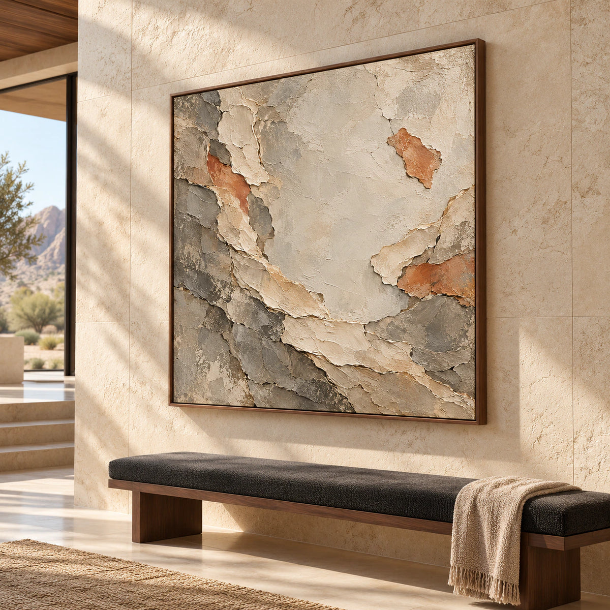 Large Marl-Unfurl painting on a tall pale stone foyer wall with a narrow bench and open floor, viewed from a low angle slightly to the right.
