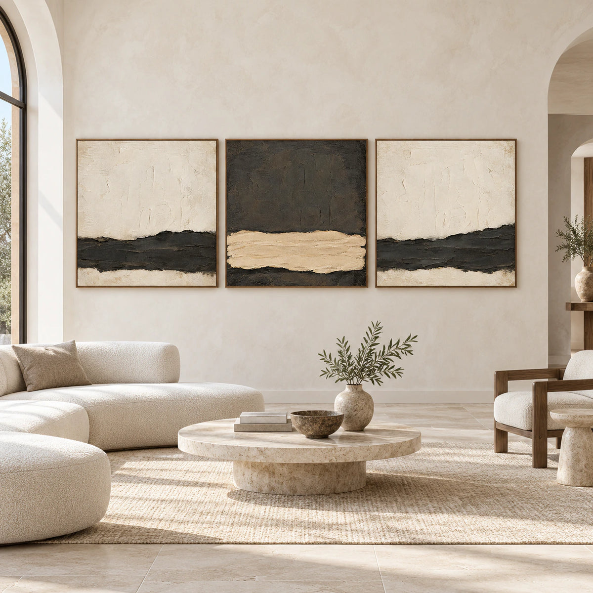 Large straight-on gallery interior with the Nocturne-Embankment charcoal and cream triptych in slim walnut frames.