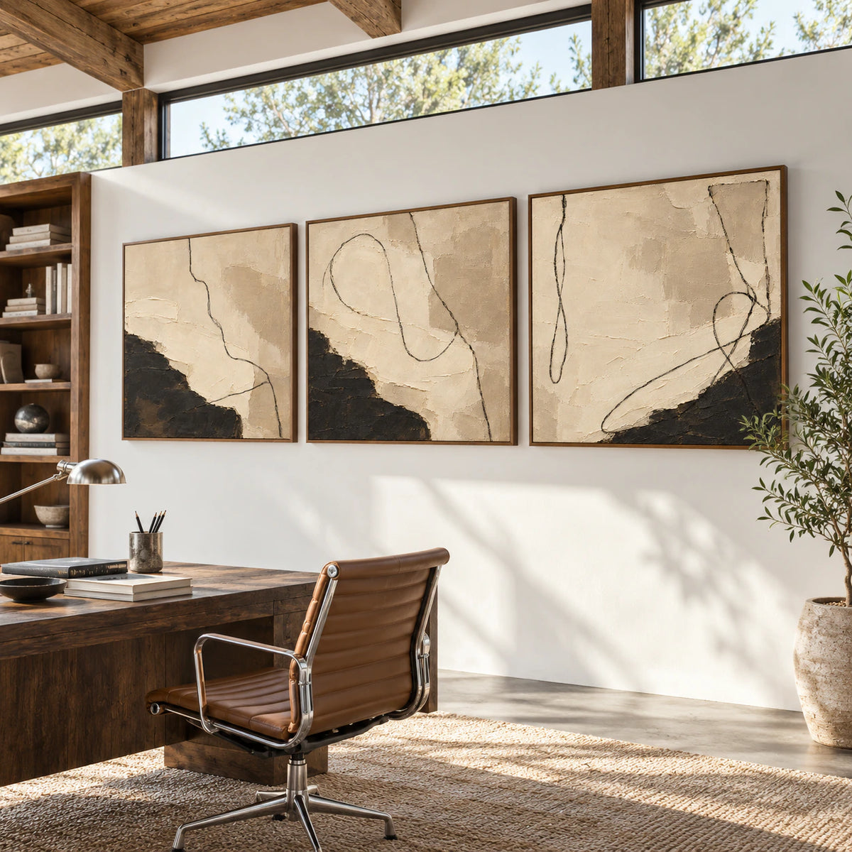 Noir-Calligraphy triptych in an airy reading and home office space.