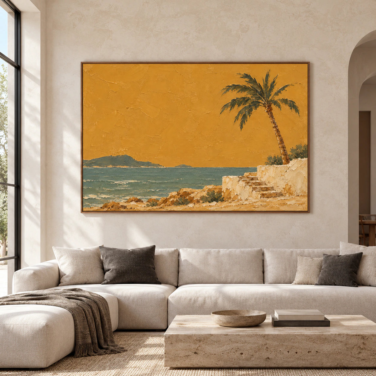 Large horizontal ochre and teal coastal painting centered on a living room wall.