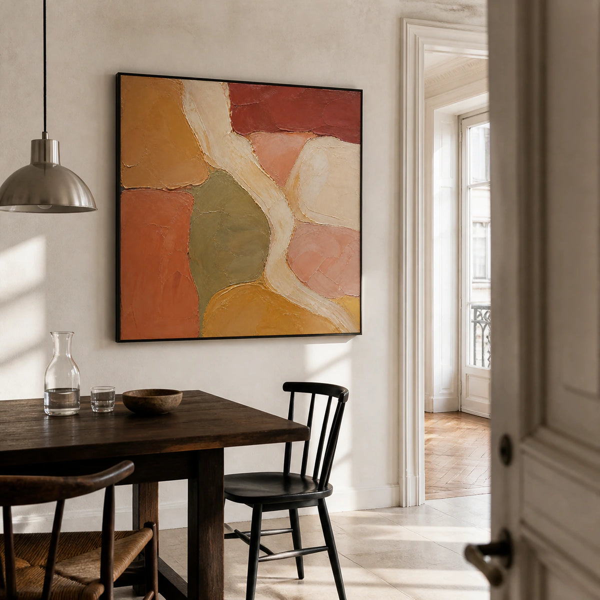 Large Ochre-Interlace artwork in a refined, sunlit dining room.