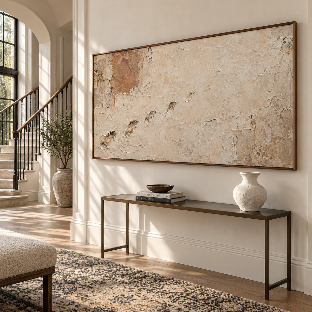 Ochre-Patina at gallery scale in an open, sunlit foyer.