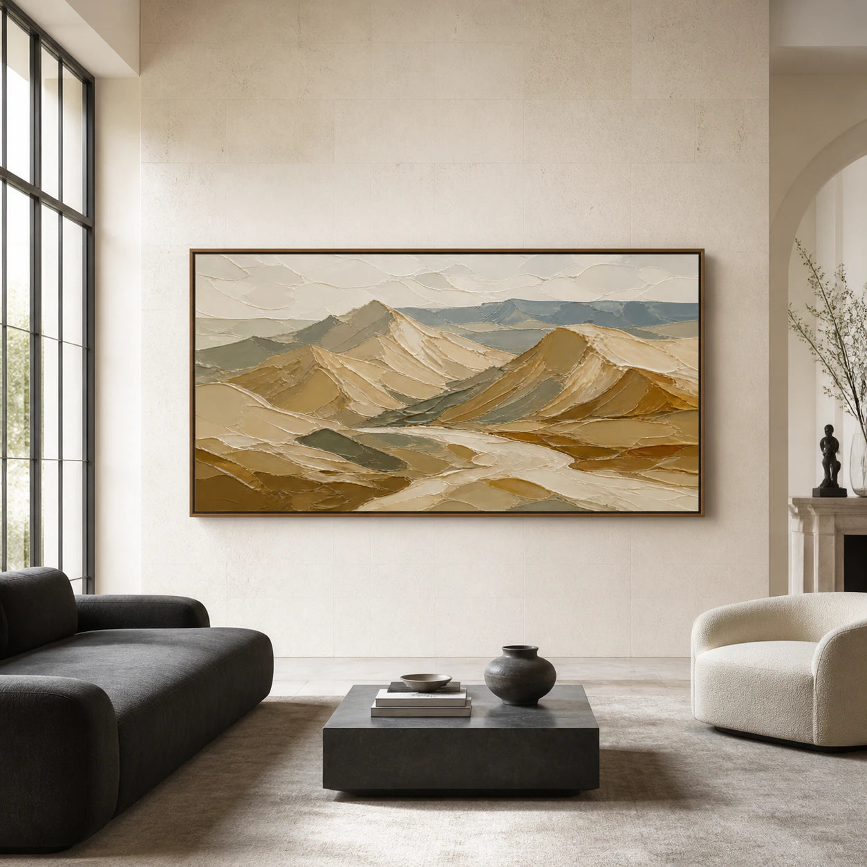 Large ochre and blue-green abstract mountain painting displayed straight-on in a bright expansive room.