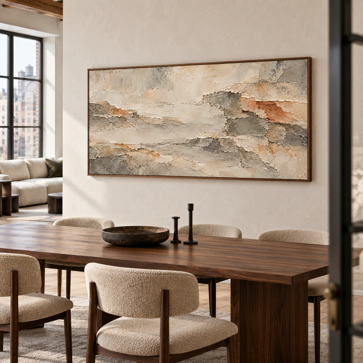 Ochre-Shards on a pale wall above a long dark walnut dining table with sculptural chairs, viewed from a right-oblique angle in natural window light.