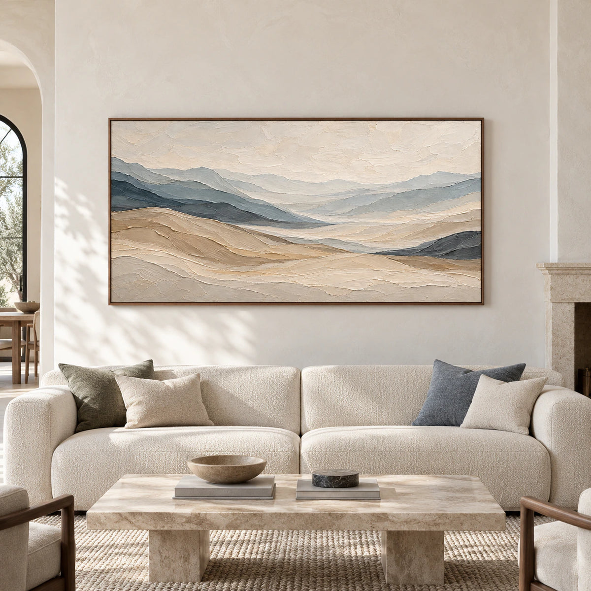 Straight-on view of Ochre-Traverse above a cream sofa in a spacious interior with bright natural daylight.