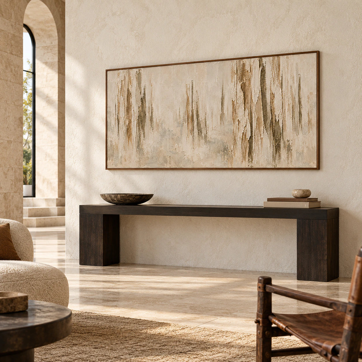 Large abstract painting commanding a gallery-scale foyer with tall pale stone walls and a dark wood console, seen from an oblique approach.