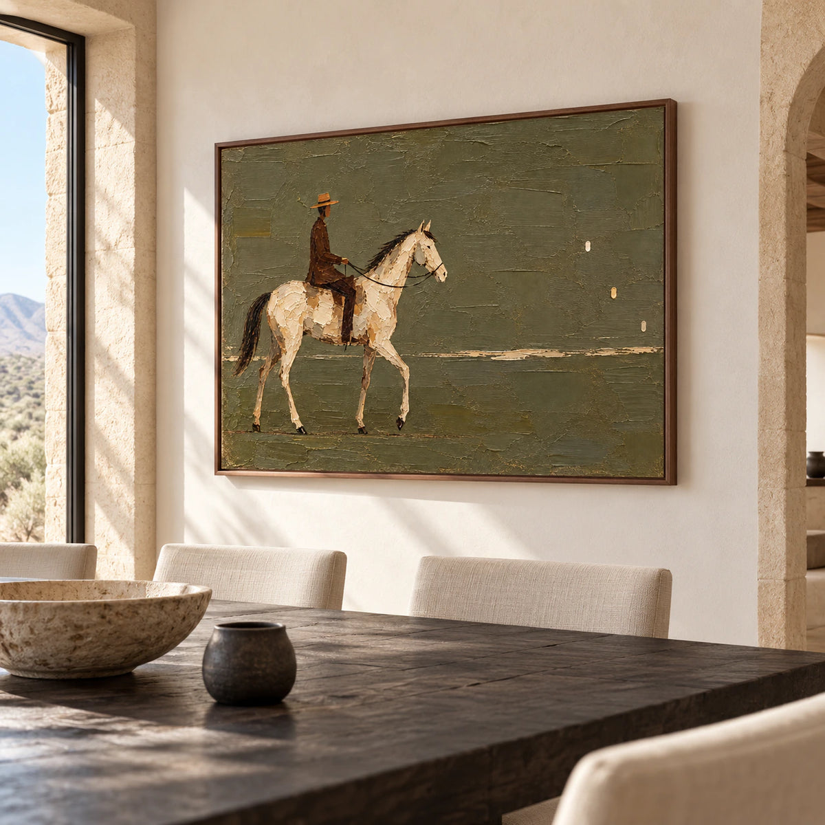 Large horizontal painting of a rider on a cream horse as the focal point of a refined dining room with a long dark wood table.