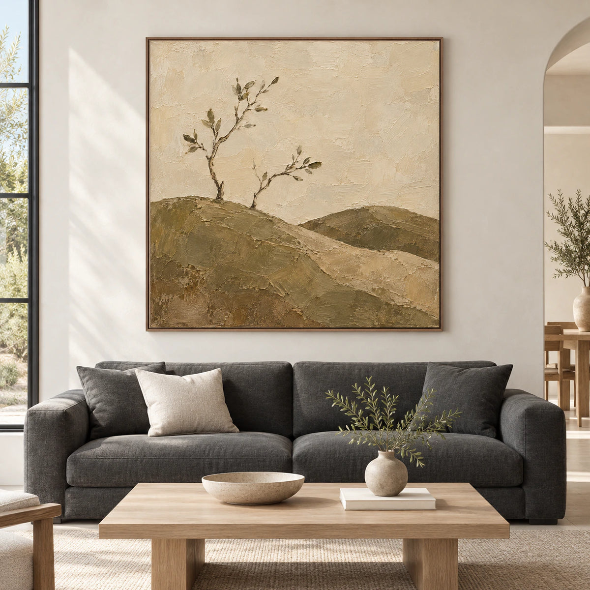 Large square olive and ivory textured landscape painting displayed straight-on in a bright, spacious architectural living room.