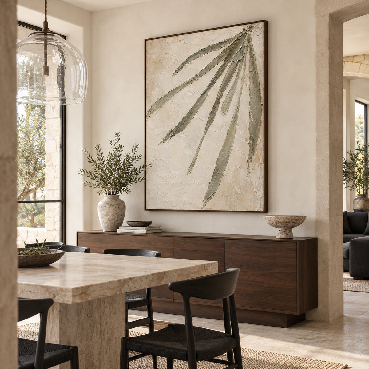 Olive-Frond displayed above a refined dining room sideboard.