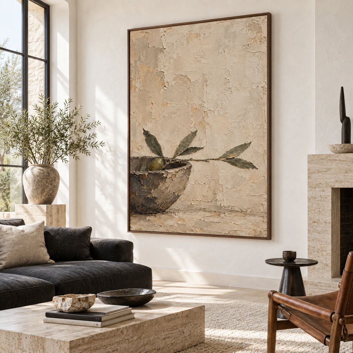 Vertical olive branch textured painting above a pale modern sofa in a bright living room.