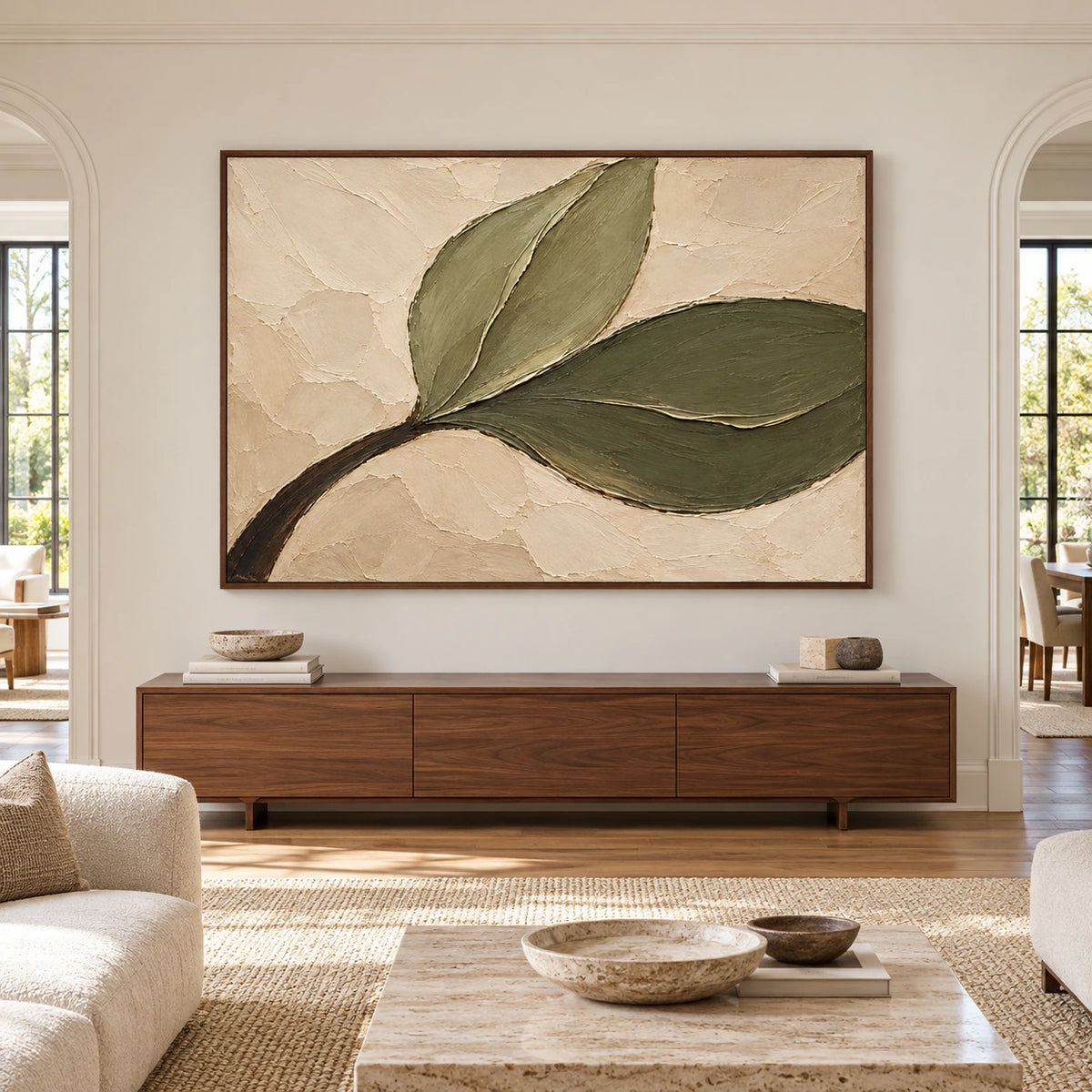 Olive-Sweep painting viewed straight-on above a low console in a spacious living room with bright natural daylight and restrained furnishings.