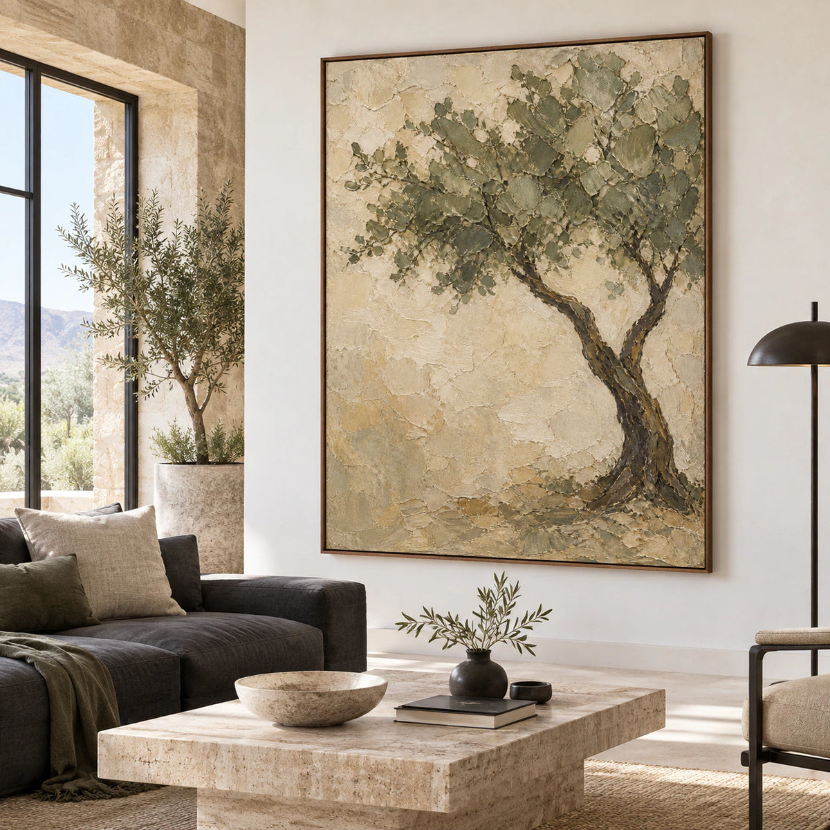 Textured olive tree painting as the focal point of a bright, open living room.
