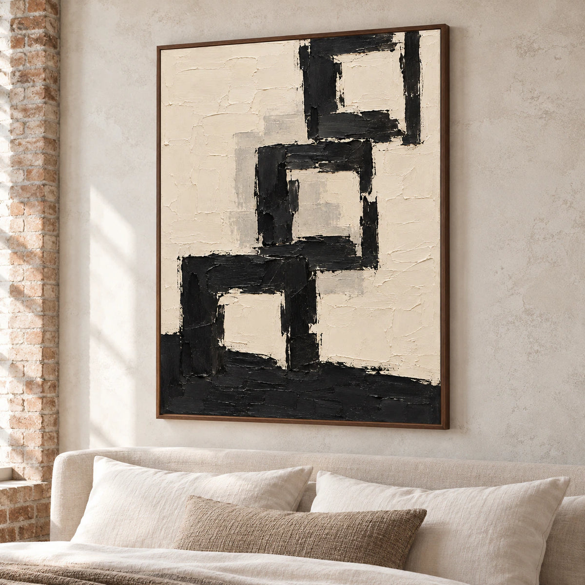 Onyx Arcade displayed above a simple bed in a quiet, bright bedroom with crisp linen, pale walls and subtle dark accents.