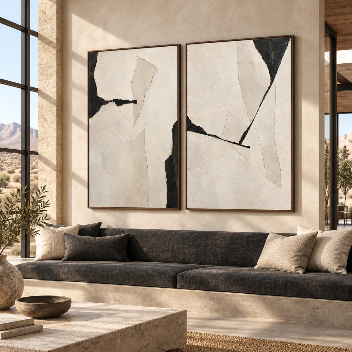 Expansive loft hospitality interior with the Onyx-Rupture paired canvas artwork.