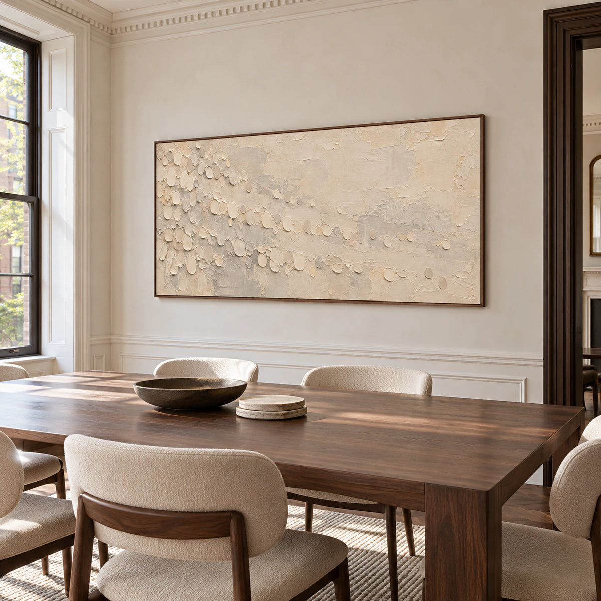 Pale-Drift centered above a long dark wood dining table in a refined, daylight-filled dining room.