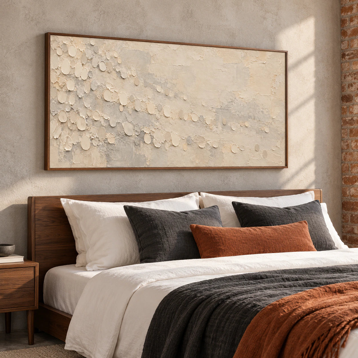Pale-Drift displayed above a simple walnut bed in a quiet, bright bedroom with soft white linens.