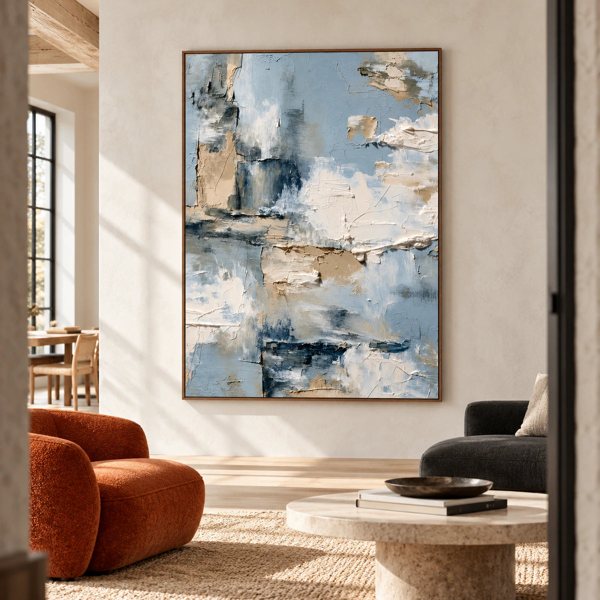 Large vertical abstract painting displayed prominently in a sunlit loft interior with high ceilings, open space and restrained furnishings.