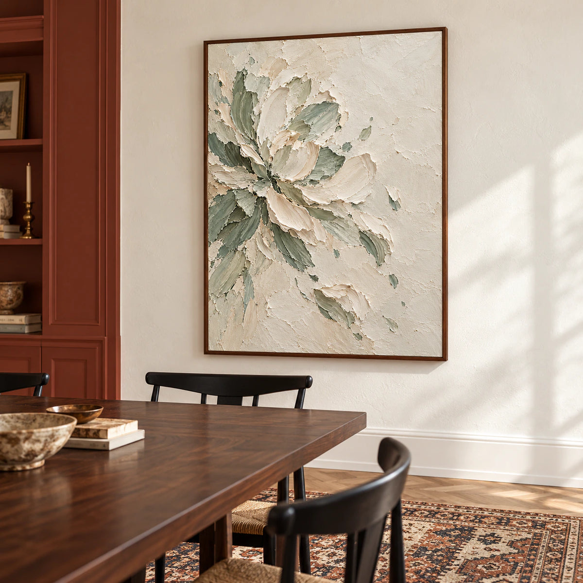 Vertical floral painting anchoring a refined dining room with a dark wood table, light stone walls and soft daylight.