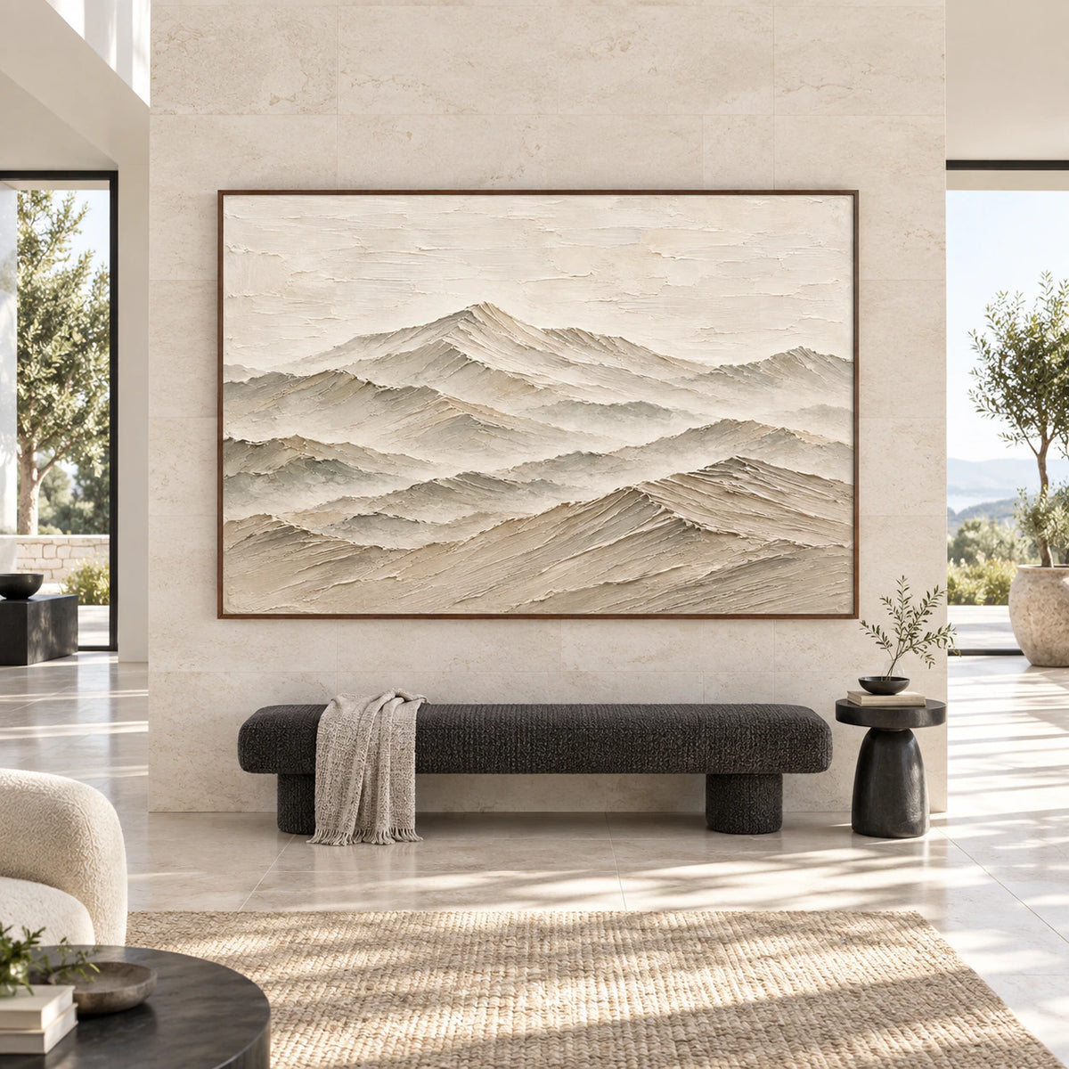 Large textured mountain artwork displayed straight-on in a spacious daylight-filled interior.