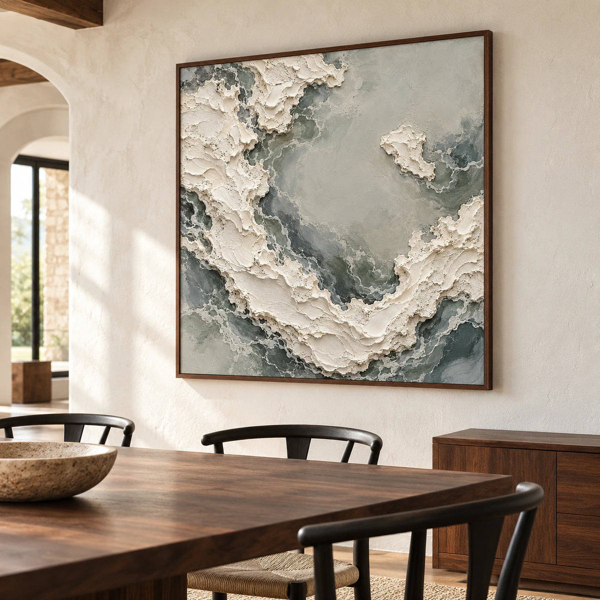 Pale-Torrent on a warm white dining room wall beside a dark walnut table and slim black chairs, viewed obliquely from the right.