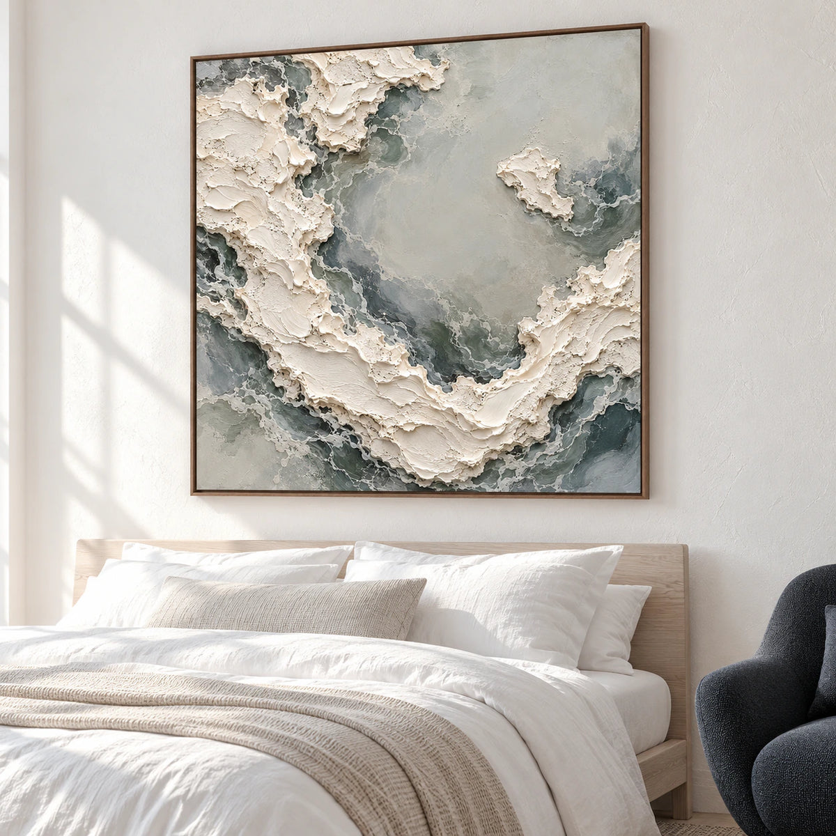Pale-Torrent above a low ash-wood bed with white linens against a muted plaster wall, viewed slightly from the left near the foot of the bed.