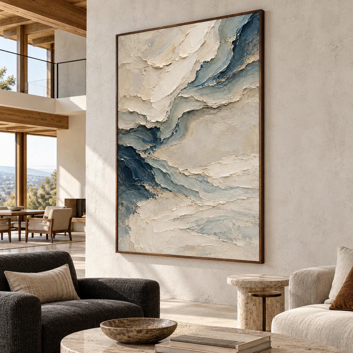 Pale-Undertow on a light concrete wall, viewed from the left in a bright, spacious hospitality loft with timber beams and a deep charcoal lounge chair.