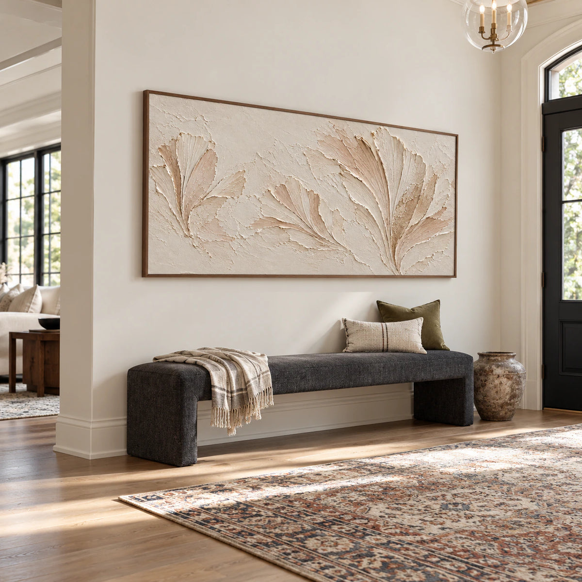 Parchment Fronds commands a gallery-scale foyer above a long charcoal bench, with pale architectural walls and tall windows.