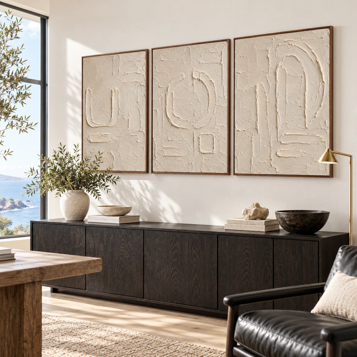 Parchment-Glyph triptych in an airy home office reading space.