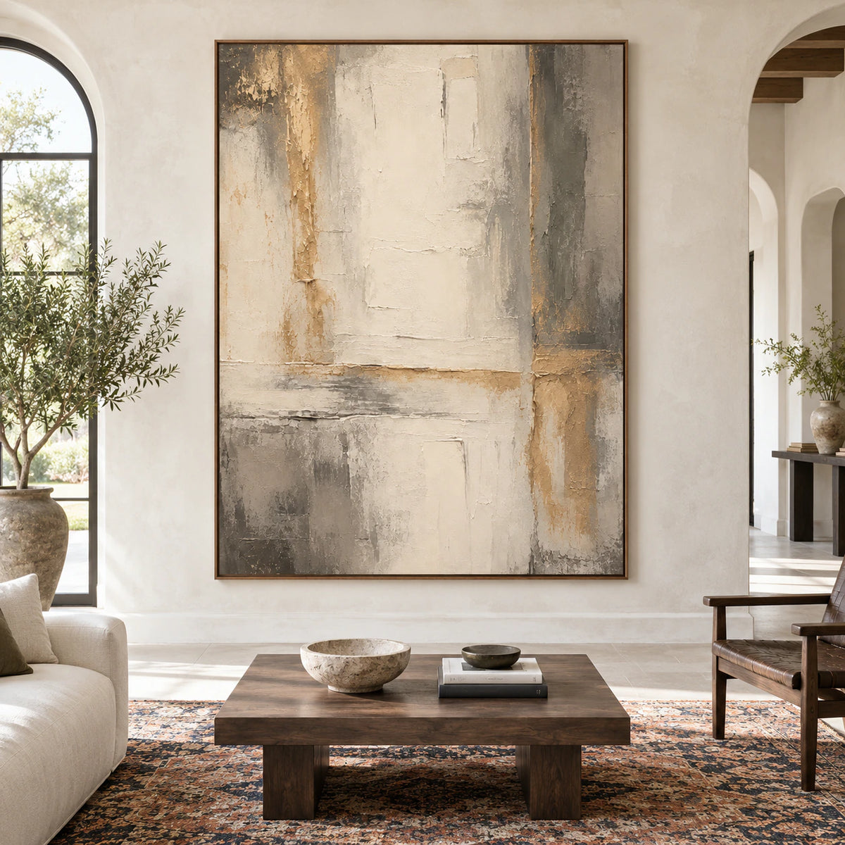 Large textured ivory, gray and ochre abstract painting shown straight-on in a spacious contemporary interior.