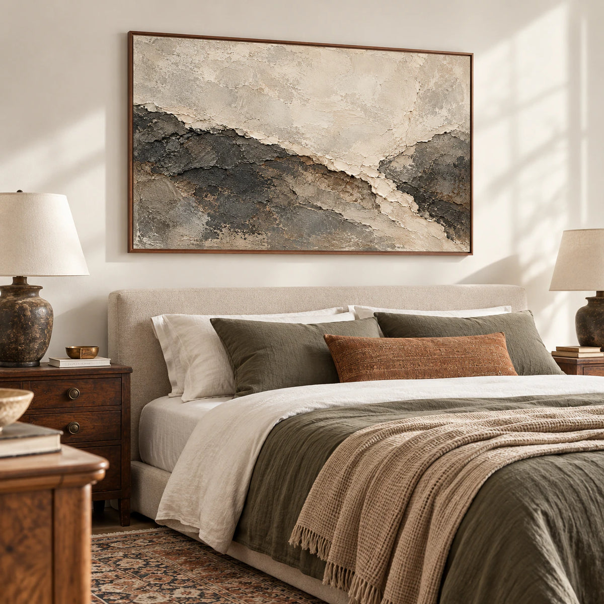 Parchment Torrent anchors a quiet bedroom above a simple upholstered bed, with soft daylight and muted, contrasting linens.
