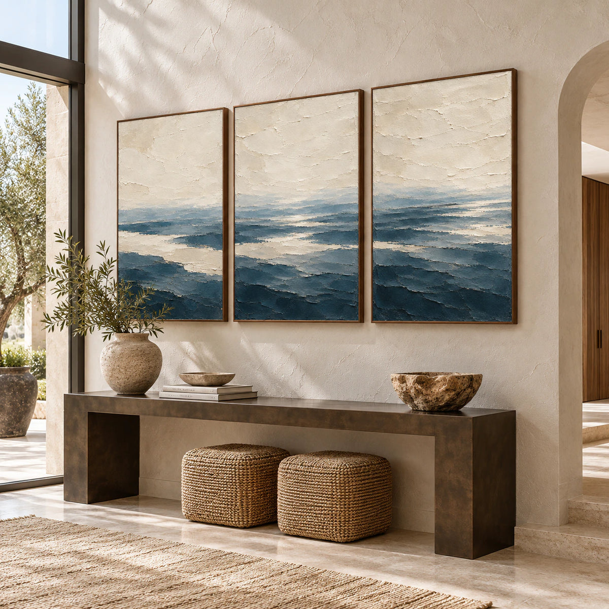 Pelagic-Strata triptych at gallery scale in a bright foyer.